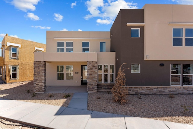 516 W Olive Ln, St George, UT 84790 - view of front facade featuring stucco siding and stone siding