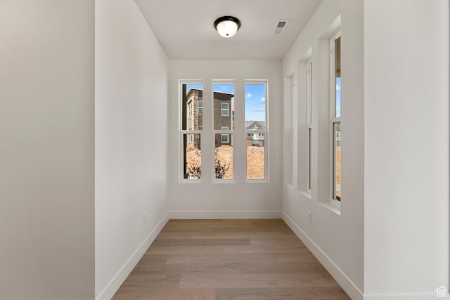 516 W Olive Ln, St George, UT 84790 - unfurnished room with light wood-type flooring and baseboards