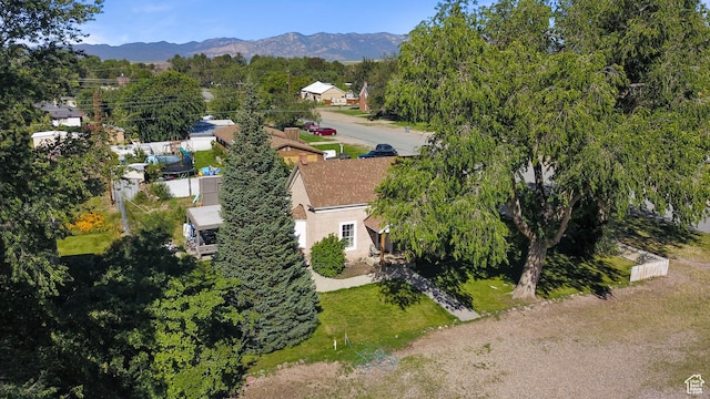 birds eye view of property featuring a mountain view