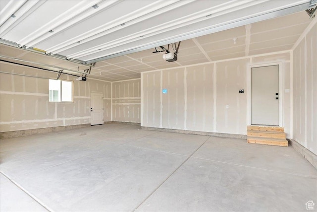 2329 E Woodbury Ln, Eagle Mountain, UT 84005 - garage featuring a garage door opener