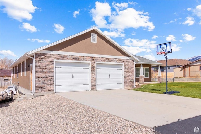 single story home featuring stone siding, fence, stucco siding, a front lawn, and driveway