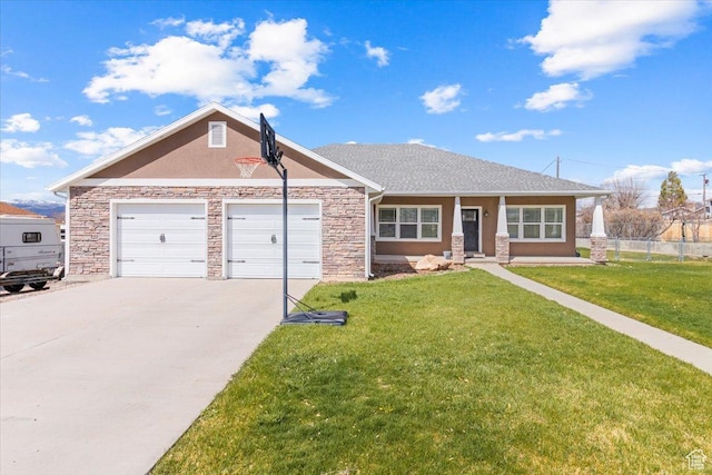 view of front of house with a front yard, a garage, concrete driveway, fence, and stucco siding