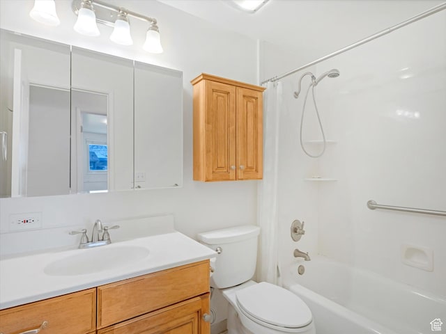 full bath featuring vanity, toilet, and shower / washtub combination