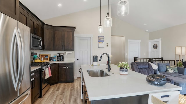 1887 N Maris St, Tooele, UT 84074 - kitchen featuring open floor plan, appliances with stainless steel finishes, a sink, and light countertops