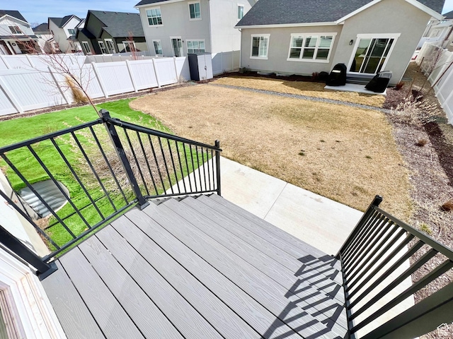 6293 W Jackson Crest Way, Herriman, UT 84096 - wooden terrace featuring a residential view, a fenced backyard, a yard, and a patio area
