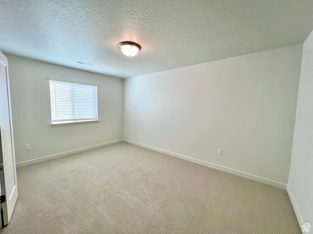 6293 W Jackson Crest Way, Herriman, UT 84096 - unfurnished room with a textured ceiling, light colored carpet, baseboards, and visible vents