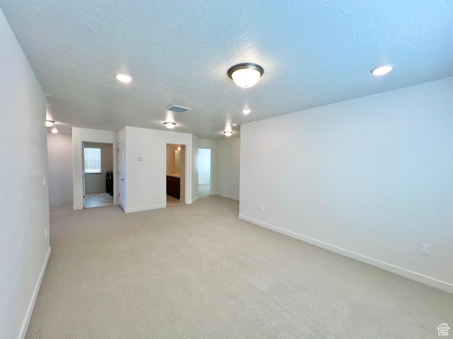 6293 W Jackson Crest Way, Herriman, UT 84096 - unfurnished room with a textured ceiling, light colored carpet, and baseboards