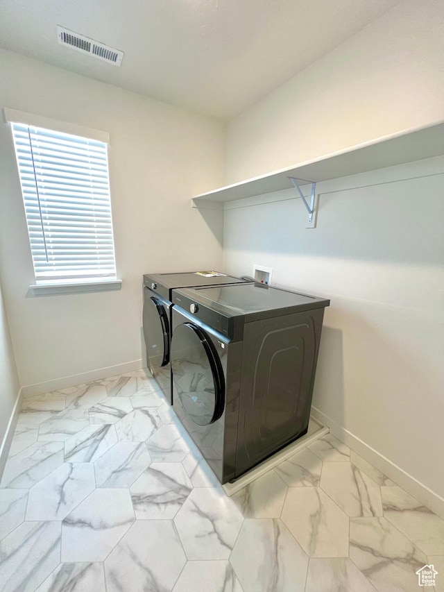 6293 W Jackson Crest Way, Herriman, UT 84096 - laundry area with visible vents, baseboards, marble finish floor, and laundry area