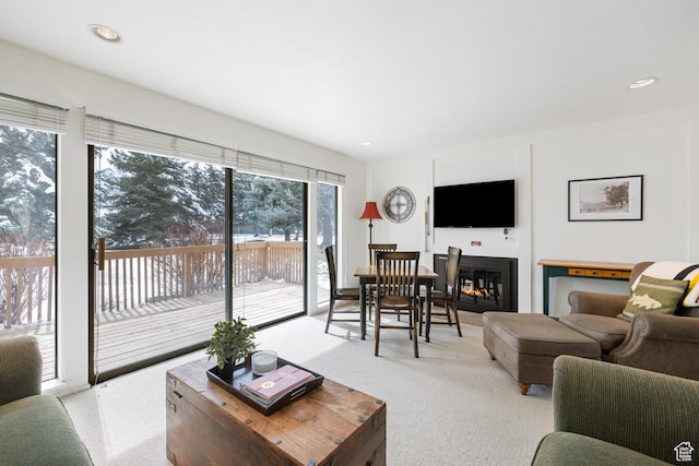 118 Davis Ct, Park City, UT 84060 - living room with light carpet, a glass covered fireplace, and recessed lighting