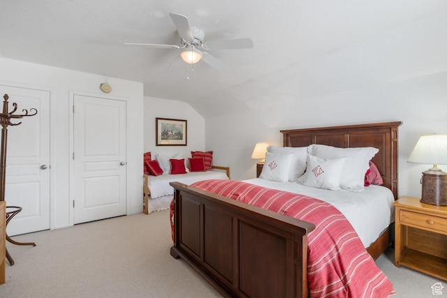 118 Davis Ct, Park City, UT 84060 - bedroom featuring light colored carpet, vaulted ceiling, and a ceiling fan