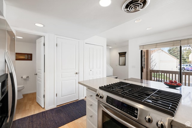 118 Davis Ct, Park City, UT 84060 - kitchen featuring visible vents, baseboards, light wood-type flooring, recessed lighting, and stainless steel appliances