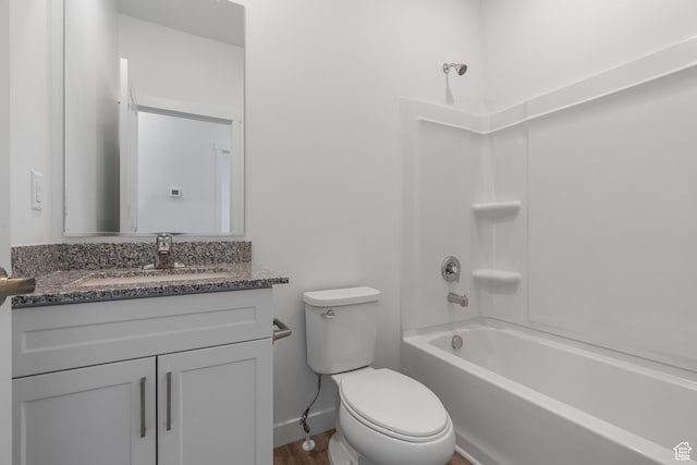 7137 Oquirrh Ranch Pkwy N, Eagle Mountain, UT 84005 - bathroom with toilet, vanity, baseboards, and  shower combination