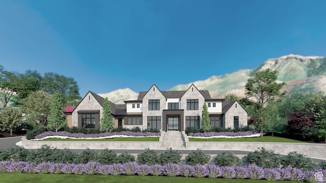 704 N Country Manor Ln, Alpine, UT 84004 - view of front of property with a standing seam roof, metal roof, stone siding, and a mountain view