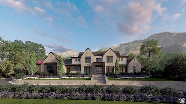 704 N Country Manor Ln, Alpine, UT 84004 - view of front of home featuring a mountain view, stone siding, metal roof, and a standing seam roof