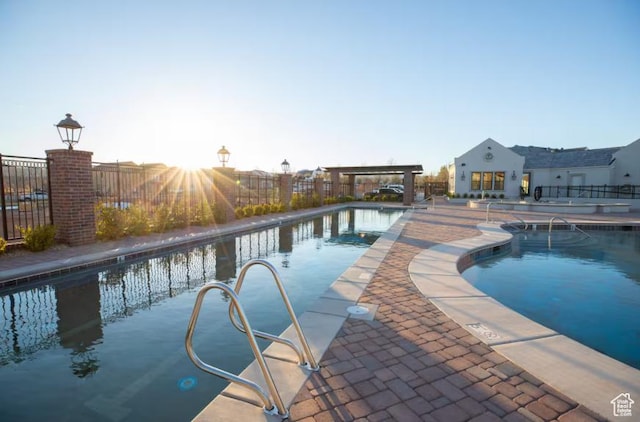4277 W Canterbury Rd, Hurricane, UT 84737 - community pool with a patio area and fence