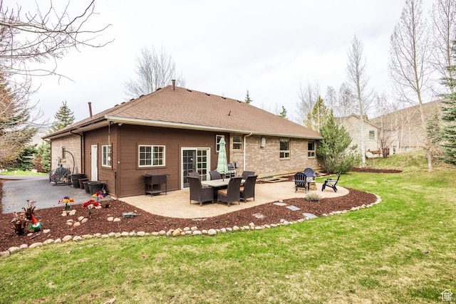 9106 N Upper Lando Ln, Park City, UT 84098 - rear view of property featuring a patio area, a yard, a fire pit, and roof with shingles