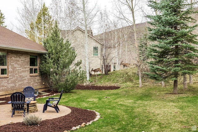 9106 N Upper Lando Ln, Park City, UT 84098 - view of grassy yard featuring a patio area