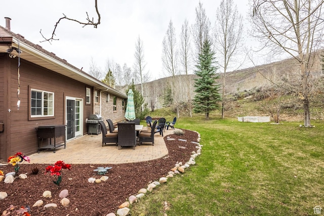 9106 N Upper Lando Ln, Park City, UT 84098 - view of green lawn featuring a patio area