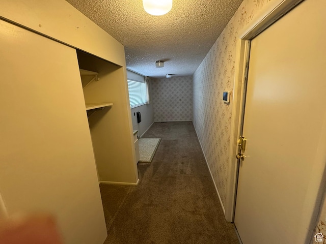 871 N Bonita Way E Unit 19, Centerville, UT 84014 - hallway featuring a textured ceiling, wallpapered walls, baseboards, and carpet