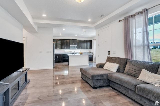 6156 W Poplar View Dr, South Jordan, UT 84009 - living room with visible vents, baseboards, and recessed lighting