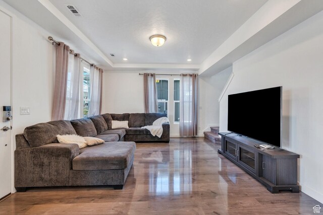 6156 W Poplar View Dr, South Jordan, UT 84009 - living room with baseboards, recessed lighting, stairs, visible vents, and a raised ceiling