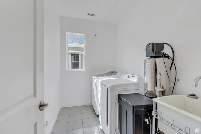 6156 W Poplar View Dr, South Jordan, UT 84009 - washroom with laundry area, light tile patterned floors, visible vents, a sink, and washing machine and dryer