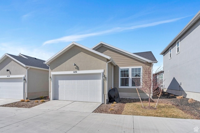 6156 W Poplar View Dr, South Jordan, UT 84009 - single story home featuring an attached garage, stucco siding, and concrete driveway