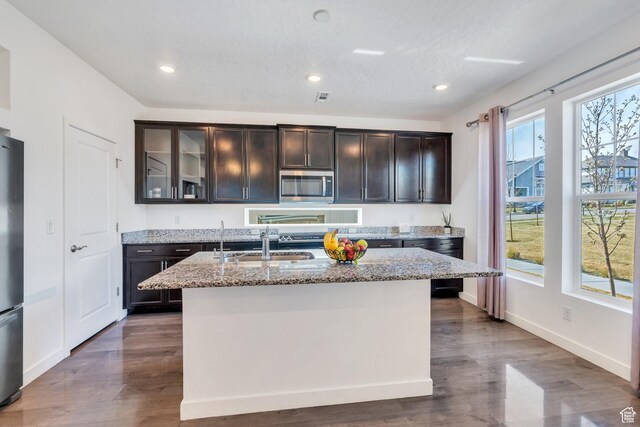 6156 W Poplar View Dr, South Jordan, UT 84009 - kitchen with stainless steel appliances, dark wood-style floors, and light stone counters