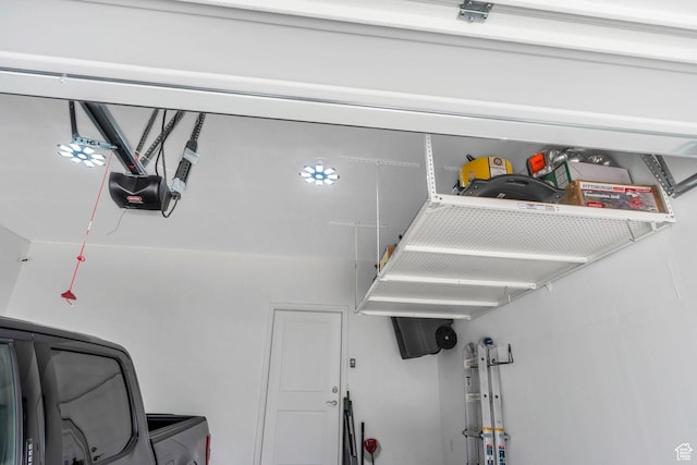 6156 W Poplar View Dr, South Jordan, UT 84009 - garage featuring washer / dryer and a garage door opener