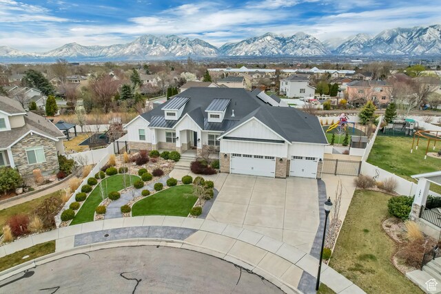 bird's eye view with a residential view and a mountain view