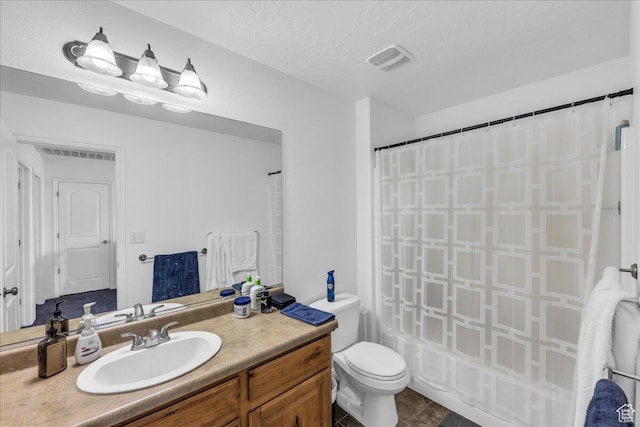 1277 W Las Hurdes Dr, St George, UT 84770 - bathroom with toilet, vanity, shower / bath combo with shower curtain, and visible vents