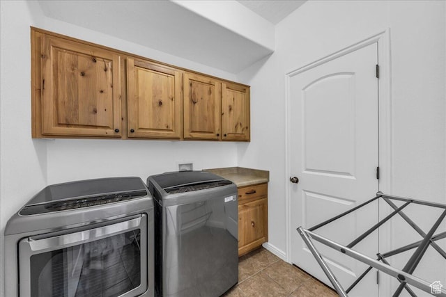 1277 W Las Hurdes Dr, St George, UT 84770 - laundry area with light tile patterned flooring, washing machine and clothes dryer, and cabinet space