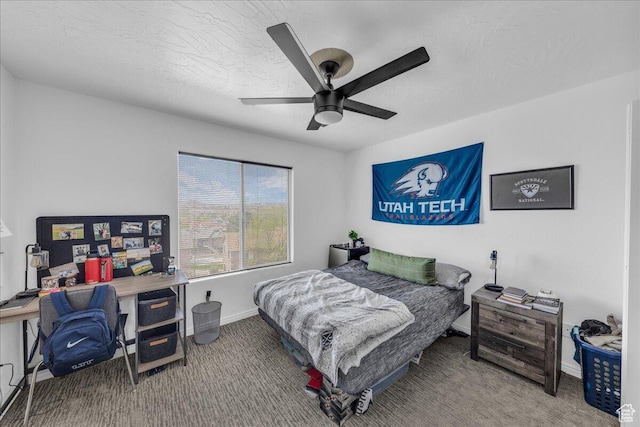 1277 W Las Hurdes Dr, St George, UT 84770 - carpeted bedroom featuring baseboards, ceiling fan, and a textured ceiling