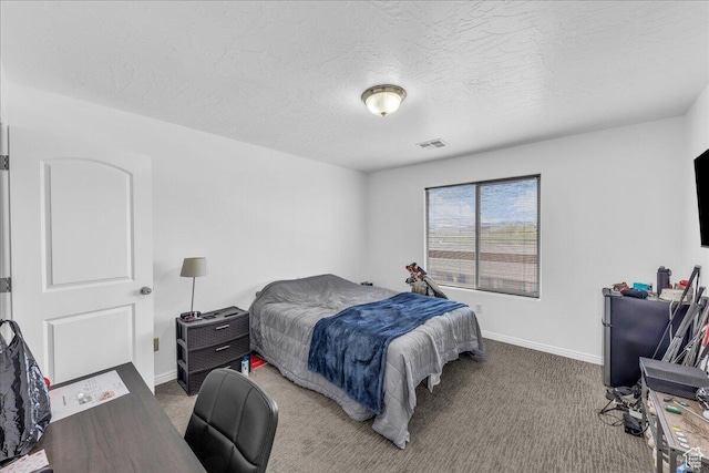 1277 W Las Hurdes Dr, St George, UT 84770 - carpeted bedroom with a textured ceiling, baseboards, and visible vents