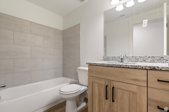 full bath with vanity, visible vents, toilet, and wood finished floors