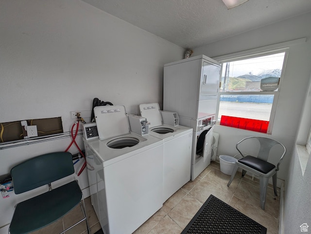 160 W 800 S, Payson, UT 84651 - community laundry room with stacked washer and dryer, washing machine and clothes dryer, and a textured ceiling