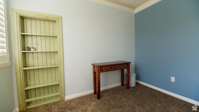 interior space with crown molding, baseboards, and carpet floors