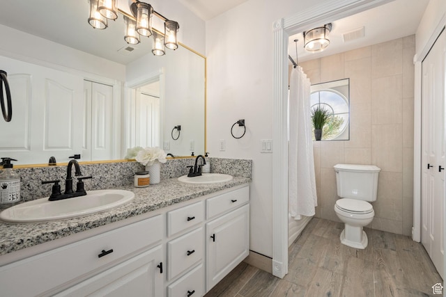 827 E 1070 S, St George, UT 84790 - full bath with a sink, visible vents, double vanity, and wood finished floors