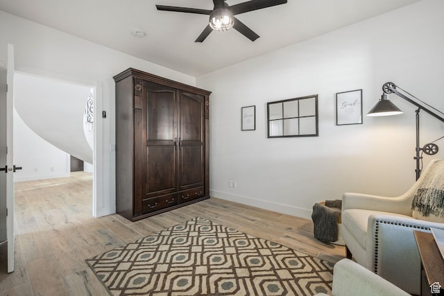 827 E 1070 S, St George, UT 84790 - living area featuring light wood finished floors, baseboards, and a ceiling fan