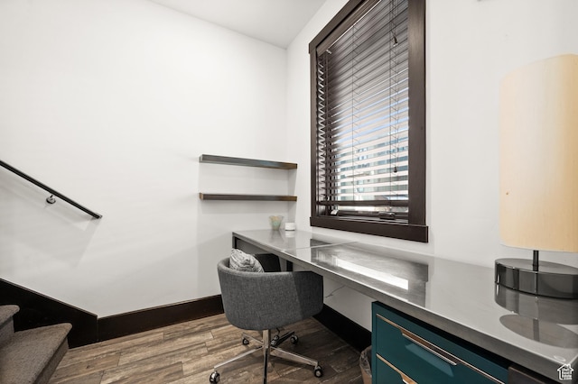 3700 Blackstone Dr Unit 9, Park City, UT 84098 - home office featuring built in study area, dark wood-type flooring, and baseboards