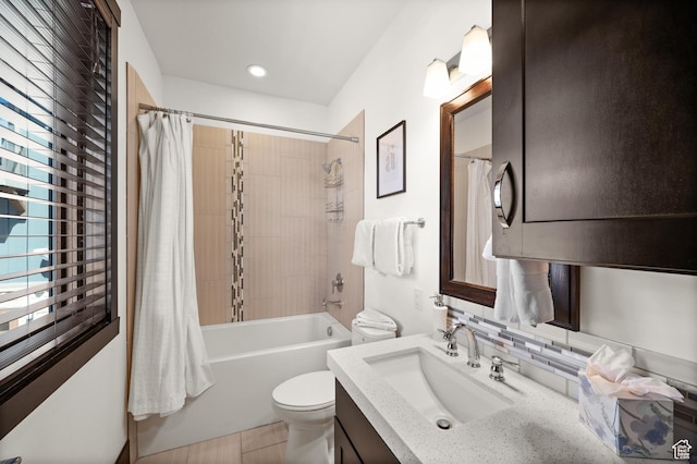 3700 Blackstone Dr Unit 9, Park City, UT 84098 - bathroom featuring shower / tub combo, toilet, vanity, and decorative backsplash