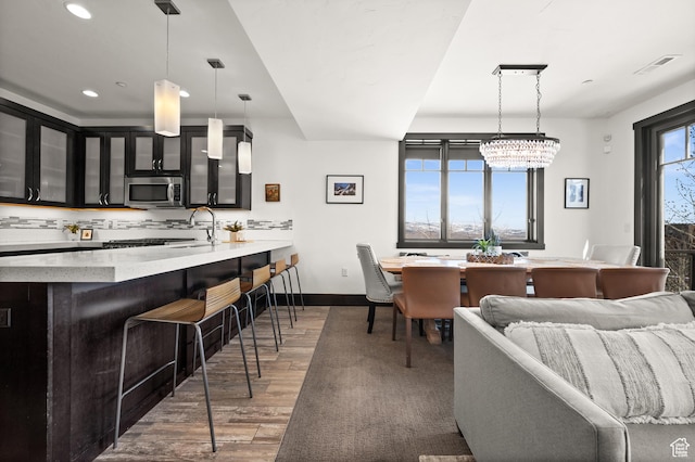 3700 Blackstone Dr Unit 9, Park City, UT 84098 - interior space with visible vents, baseboards, a chandelier, recessed lighting, and wood finished floors