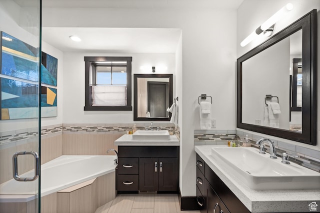 3700 Blackstone Dr Unit 9, Park City, UT 84098 - bathroom featuring a sink, two vanities, tile patterned flooring, and a garden tub