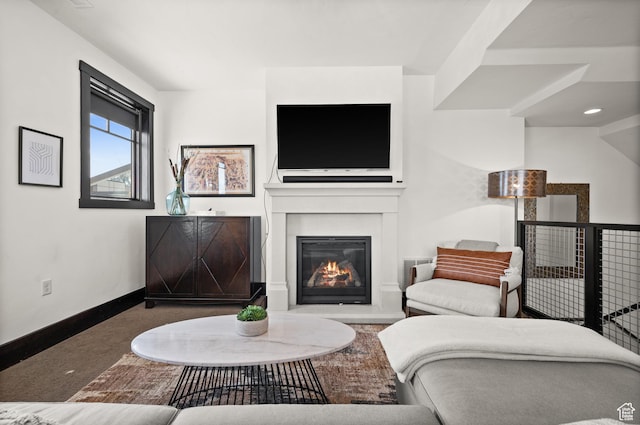 3700 Blackstone Dr Unit 9, Park City, UT 84098 - carpeted living area featuring baseboards and a glass covered fireplace