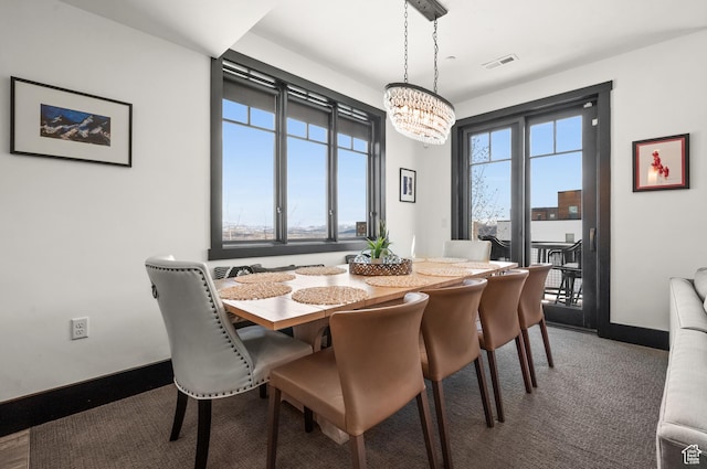 3700 Blackstone Dr Unit 9, Park City, UT 84098 - dining room with visible vents, baseboards, and an inviting chandelier