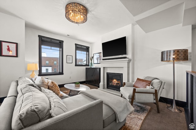 3700 Blackstone Dr Unit 9, Park City, UT 84098 - carpeted living area with visible vents, baseboards, and a glass covered fireplace