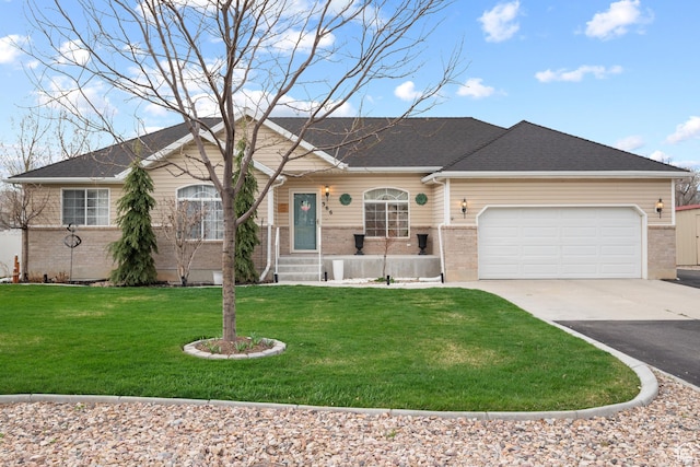 ranch-style home with an attached garage, driveway, a front yard, and brick siding