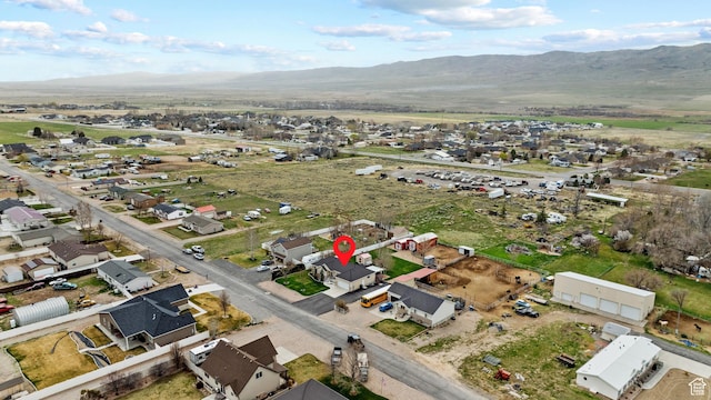 bird's eye view featuring a residential view and a mountain view