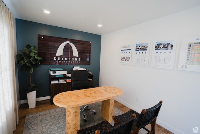 office area featuring baseboards, recessed lighting, and wood finished floors