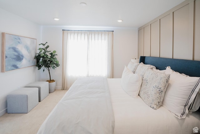 bedroom with recessed lighting and carpet flooring